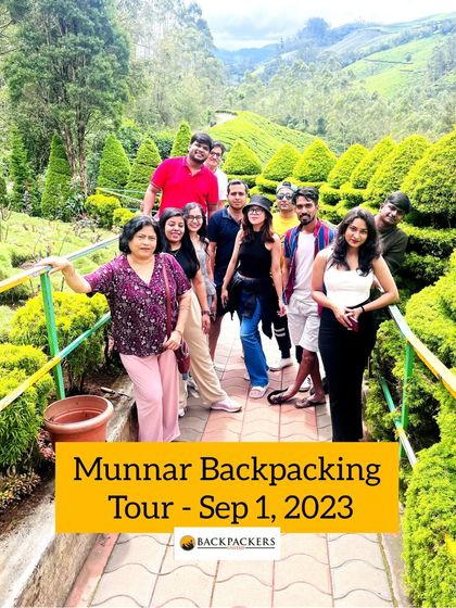 Our happy group from the Munnar backpacking tour in September, posing in a beautiful garden.