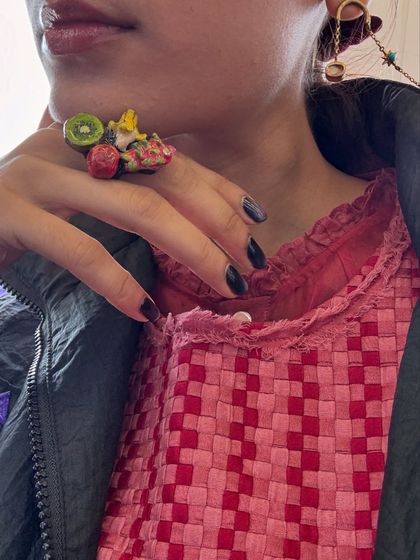 A close-up of this super quirky fruit chaat ring. I believe accessories should be fun and a reflection of your personality. A single statement piece like this can be a great conversation starter.