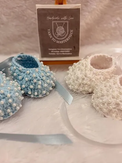 My pearl-studded booties are one of my most requested items, and here you can see why they're so versatile. I can create them in classic white for formal events or in soft pastels like this baby blue for a touch of color.