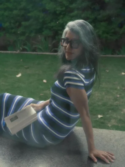 A dreamy, soft-focus shot from the "Geeky Girl" series, with a book as the perfect accessory.