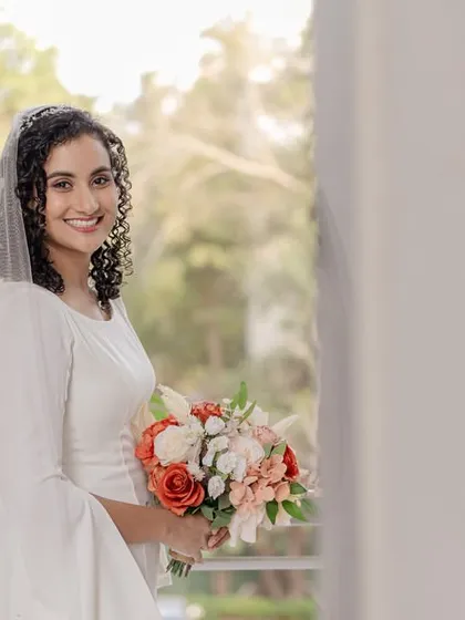 Another beautiful shot of our curly bride, looking radiant and confident on her special day.