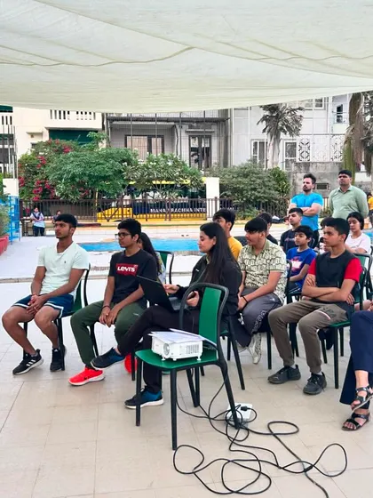 Our coaching and sports science staff addressing the academy members. These sessions are crucial for aligning goals and setting expectations for the season ahead, reinforcing the partnership between our team, the swimmers, and their families.