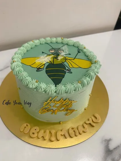 A fun cake for a fan of the movie "Makkhi" (The Fly).