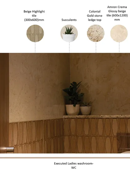 An annotated image of the ladies' washroom WC area. We selected beige highlight tiles and succulents to create a warm, natural feel, complementing the glossy beige wall tiles for a serene and sophisticated finish.