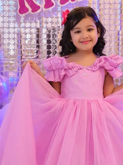 Princess Kyra showing off her beautiful birthday dress. We capture a variety of posed and candid shots to give you a full album of memories.