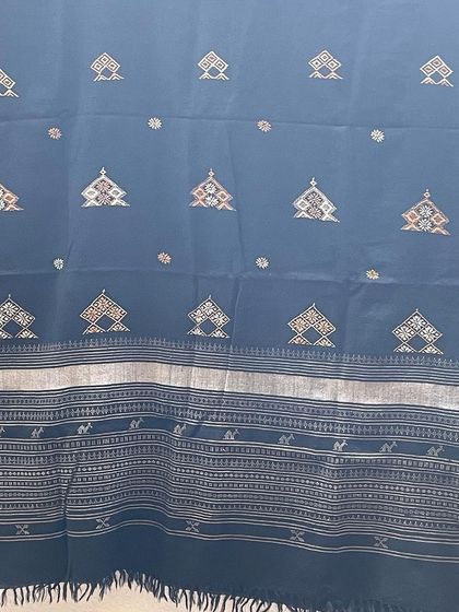 Another example of a hand-embroidered woollen shawl, perfect for the winter season. The intricate patterns are stitched with care by my artisans.