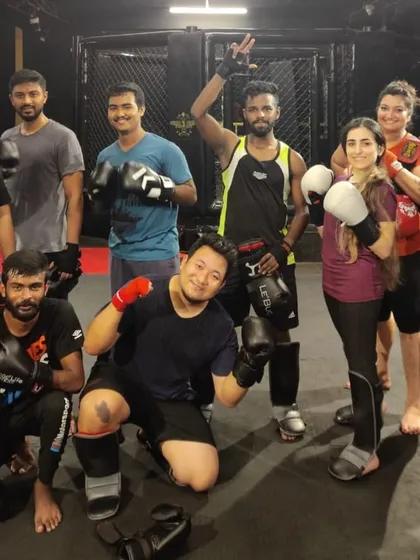 Our kickboxing curriculum is like poetry; we build solid fundamentals first, which then allows for more creative and advanced techniques. Here's the squad after a great class.