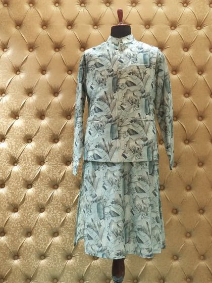 This printed kurta and jacket set offers a modern, eclectic look for festive events, showcasing a playful yet sophisticated pattern.