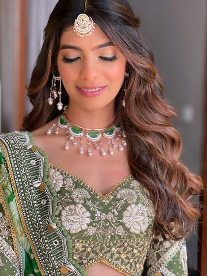 A final look at the soft, shimmery eye makeup. It adds a touch of glamour without overpowering the overall natural and fresh feel of the look.