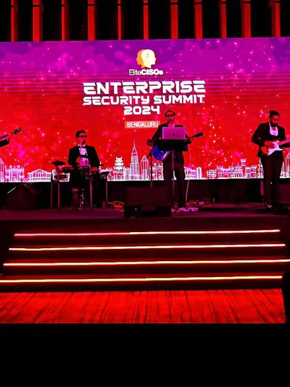 A wide shot of our full band setup for the Enterprise Security Summit, showcasing our professional stage presence.