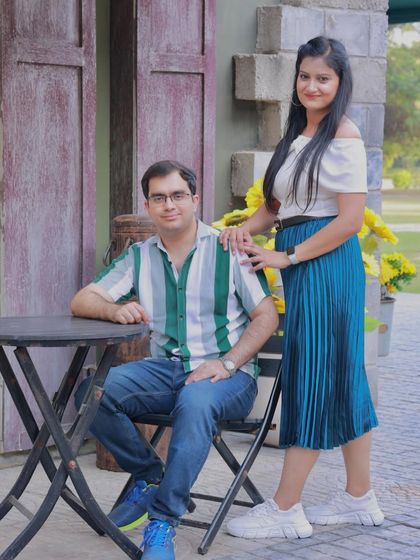 A relaxed and casual portrait. The makeup is minimal and fresh, enhancing her natural beauty.