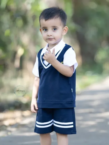 A quiet moment of contemplation during an outdoor shoot. Even when they are not smiling, a child's innocent expression tells a beautiful story.