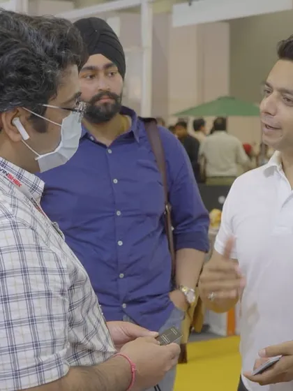 Answering questions and sharing insights at our expo booth. We believe in building relationships and helping our clients understand the full potential of smart home automation.