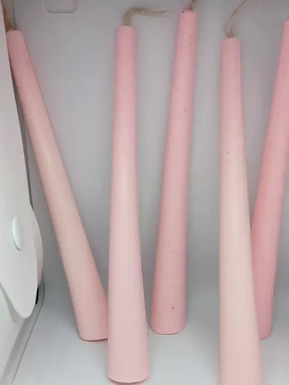 My tapered cone candles in a lovely shade of pink. These are perfect for creating an elegant tablescape for dinners and celebrations.