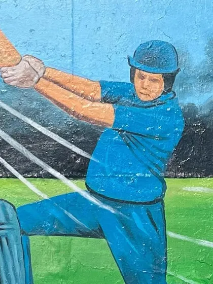 A mural celebrating cricket, the city's most beloved sport.