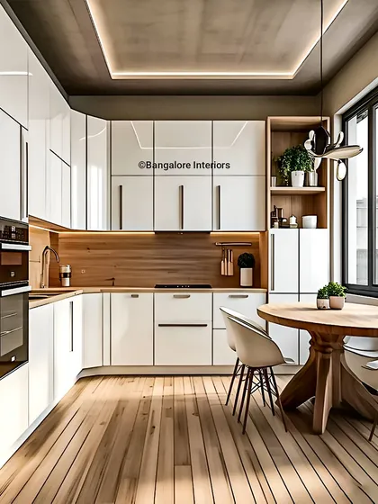 This bright, L-shaped kitchen is a perfect example of how I blend modern white cabinetry with warm wood tones to create a space that feels both clean and inviting. The design incorporates under-cabinet lighting for task areas and a cozy dining nook, making it a functional heart of the home.