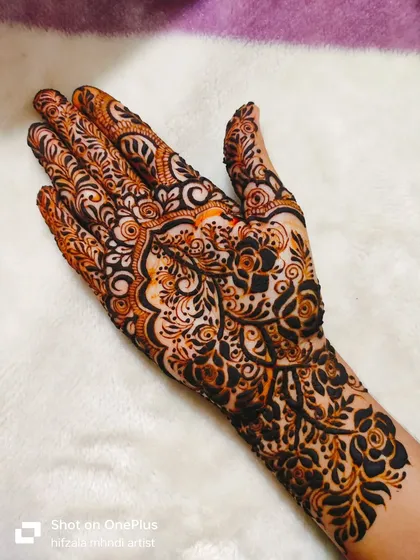 A close-up of the palm in this detailed design, showing the fine lines and beautiful motifs.