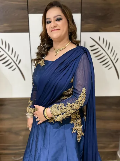 The same client, smiling and confident in her full look. The smokey eye makes a statement, while the rest of the makeup is kept balanced and elegant.