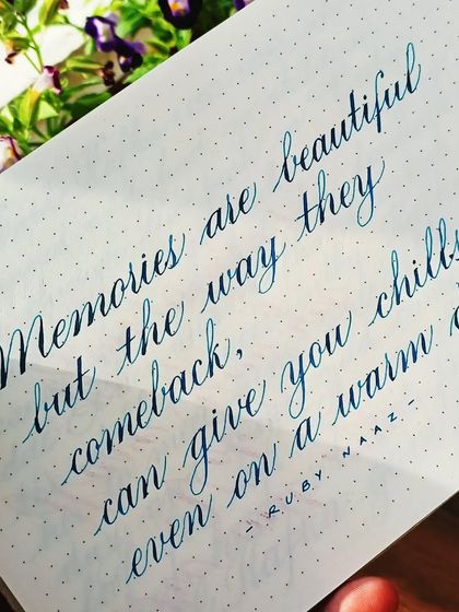 A close-up of the handwritten poem on memories, showcasing the beauty of the ink and cursive script.
