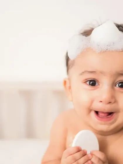 This is a moment of pure, unscripted happiness from a baby skincare brand campaign. The goal was to create an image that felt both professional for the brand and deeply personal, capturing the gentle, safe, and joyful experience of bath time.