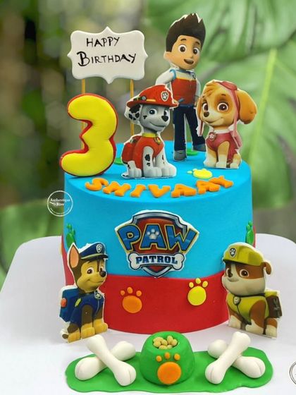 A vibrant Paw Patrol cake with Ryder and the team. This cake is perfect for a 3rd birthday, featuring all the favorite characters in a colorful setting.