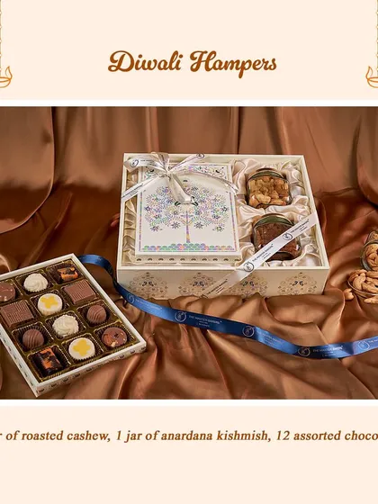 A simple yet elegant gift option, this hamper includes a jar of roasted cashews, a jar of anardana kishmish, and a box of 12 assorted chocolates, all tied together with a beautiful ribbon.