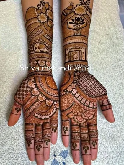 This design combines several classic elements, including delicate florals, small elephants, a central lotus, and a peacock, creating a balanced and traditional look.