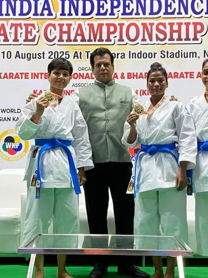 Posing with the gold medal winners in a women's Kata category at the Independence Cup. These athletes are the future of Indian karate.