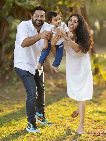 A playful family portrait in the park. I love capturing the energy and happiness when families are just being themselves.