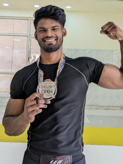 Ajay Shankar proudly displaying his silver medal from the No-Gi division.