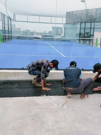 Our crew meticulously fits the drain mats together, ensuring complete coverage. This attention to detail in the foundational stage is key to a long-lasting and problem-free rooftop landscape.