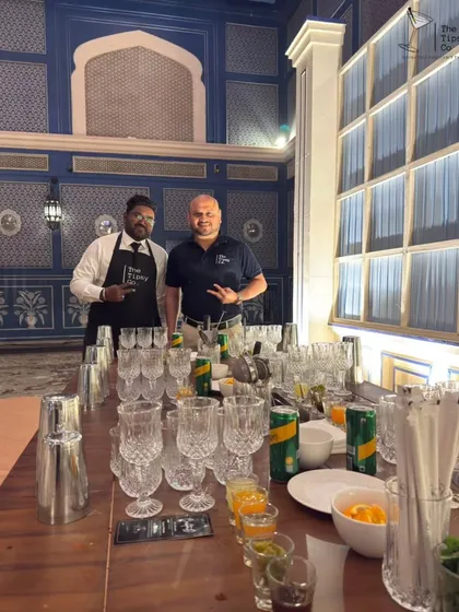 Our founder, Sid, leading a mocktail workshop at a wedding. This image shows the setup with all the necessary glassware, shakers, and fresh ingredients ready for the guests.