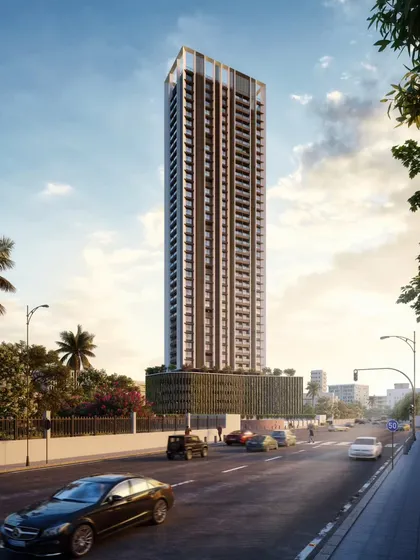 A residential tower designed for the outskirts of Mumbai. The facade features sleek angular fins and louvers, a sustainable design strategy to optimize sunlight and natural ventilation.