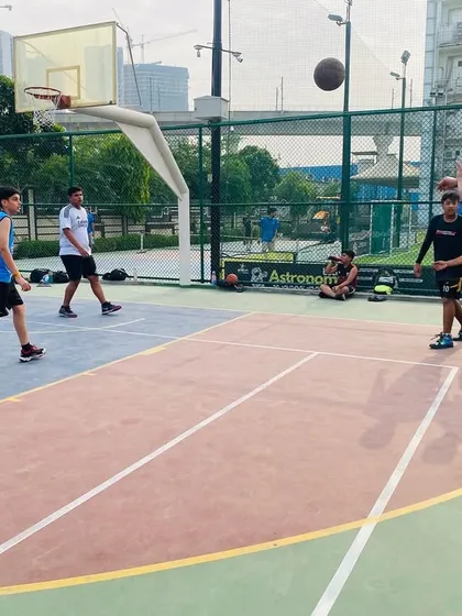 A player passes the ball out to the perimeter. We teach players to make the extra pass to find the best possible shot.