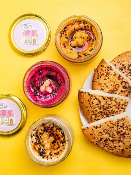 I make my own hummus in three delicious flavors: Classic, Beetroot, and Roasted Pepper. They come in cute jars and are perfect for dipping.