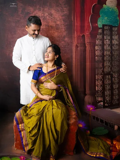 A candid, loving glance between the couple during their traditional maternity session. These quiet, in-between moments are just as beautiful as the posed portraits.