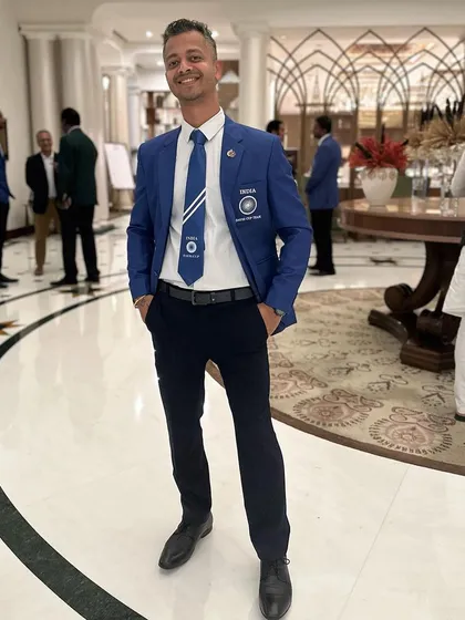 Dressed in the official Team India blazer. This isn't just a uniform; it's a symbol of the pride and professionalism I bring to my role as a sports physiotherapist for the national team.