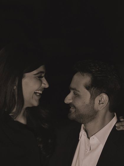 The shared glance and smiles in this photo say everything. Our goal in couple photography is to create a comfortable space where these genuine emotions can shine through.