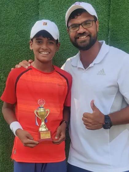 Rishikesh Mane with his runner-up trophy from the Under-12 Singles event at the All India Super Series in Jaipur. Competing against the best in the country hones a player's skills.