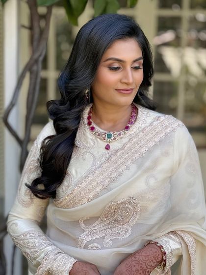 An eyes-closed shot to show the subtle, clean eye makeup.