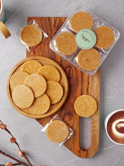 My classic peanut and jaggery chikki, individually wrapped for freshness. It’s the perfect wholesome snack to enjoy with a cup of coffee or share with loved ones during the winter season.