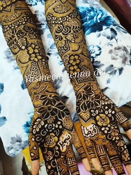 Faiza's mehndi journey, from the fresh paste to the final look. This design features a mix of geometric and floral patterns, with names personalized on the palms.