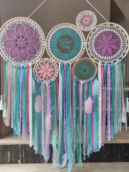 We believe in doing what you love, forever. This pastel cluster dreamcatcher, featuring the names 'Rehan' and 'Ruhy', is a testament to that passion, combining soft colors and intricate details.