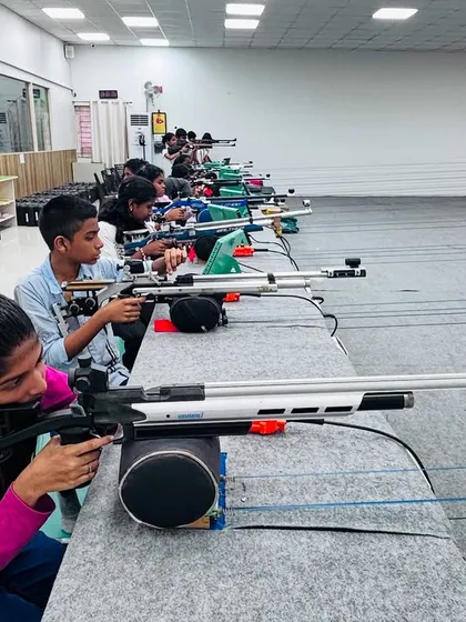 A long shot of our range during a training session with Carmel Academy students, showing them practicing in a structured and professional setting.