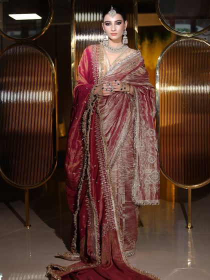 Another shot of the bride in the velvet shawl, looking regal and elegant.
