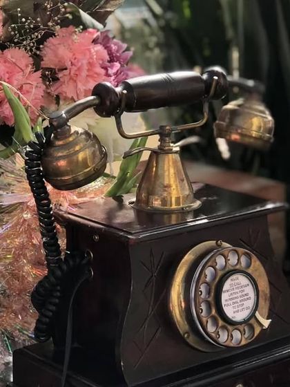 Vintage details for a 70th birthday brunch. This classic rotary telephone added a touch of nostalgia and charm to the decor.