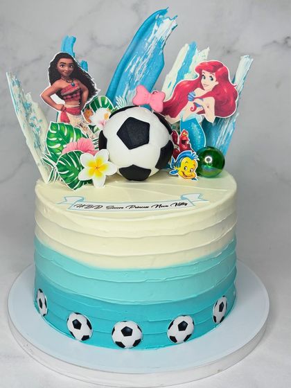 When the birthday kid can't decide on a theme, why not combine them? This cake features Moana, The Little Mermaid, and soccer, all on one ocean-themed cake.
