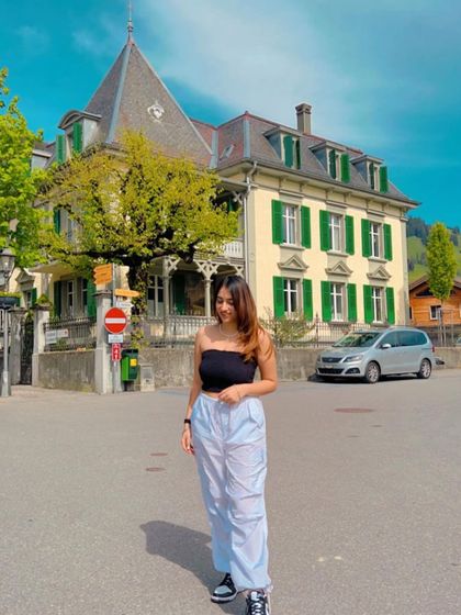 A chic look in a European town. This content is perfect for brands targeting international travelers.