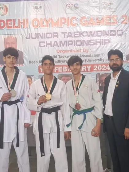 A group of our junior medalists at the Delhi Olympic Games. Their success is a reflection of their dedication to training.