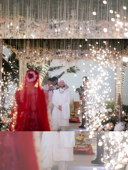 The groom's first look at his bride. I love creating these powerful moments, using special effects like cold pyros to heighten the emotion as the bride makes her grand entrance.